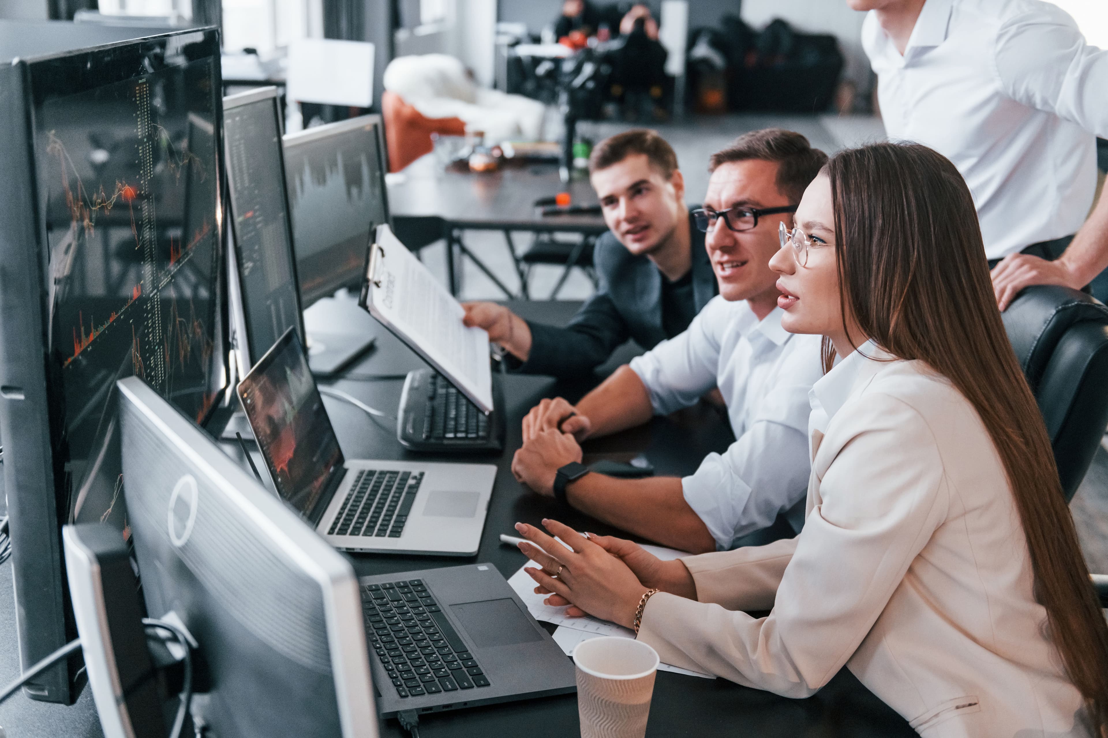analysing-information-team-of-stockbrokers-works-2025-03-18-21-44-02-utc.jpg