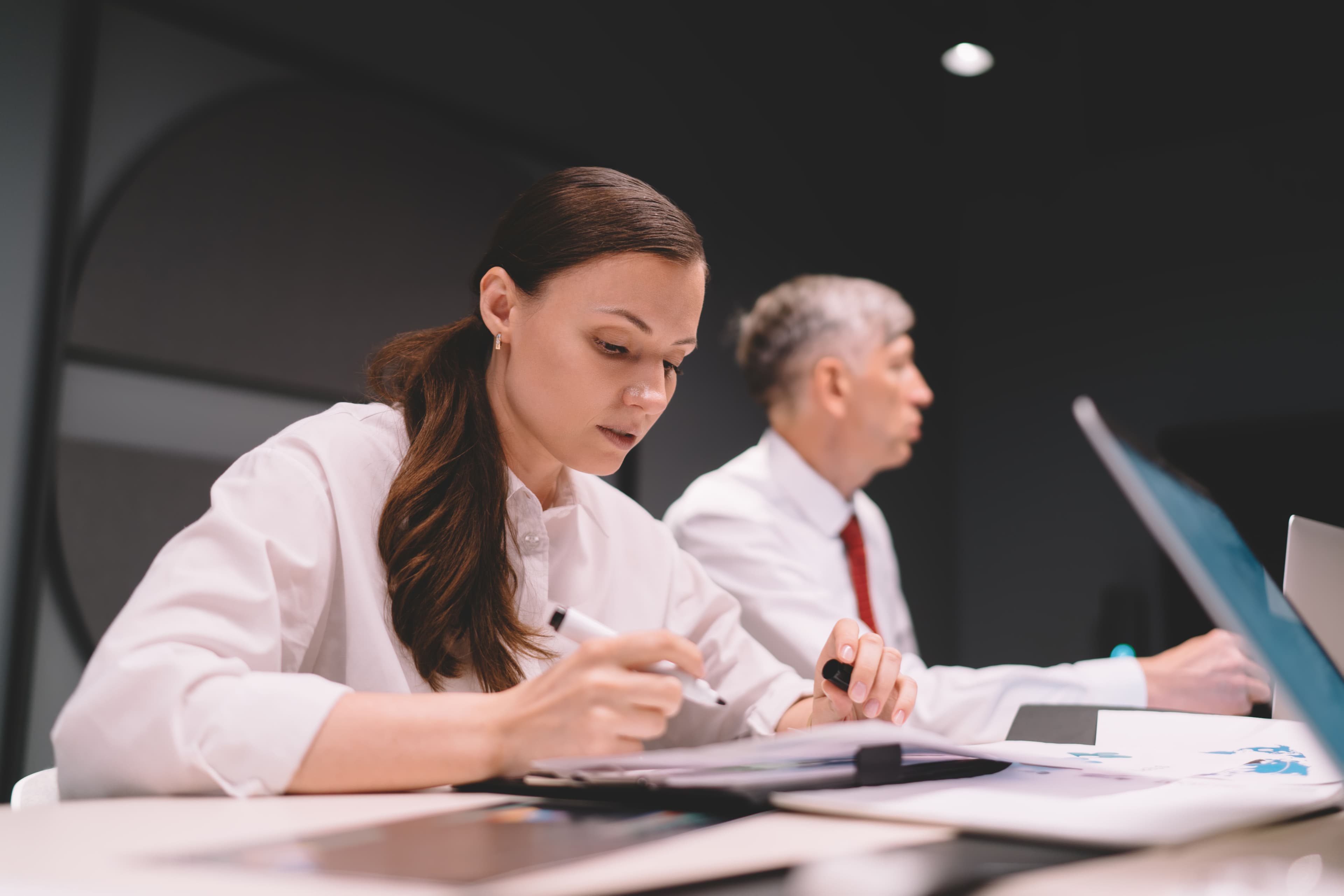 businesswoman-listening-seminar-in-workspace-2025-03-26-21-54-25-utc.jpg