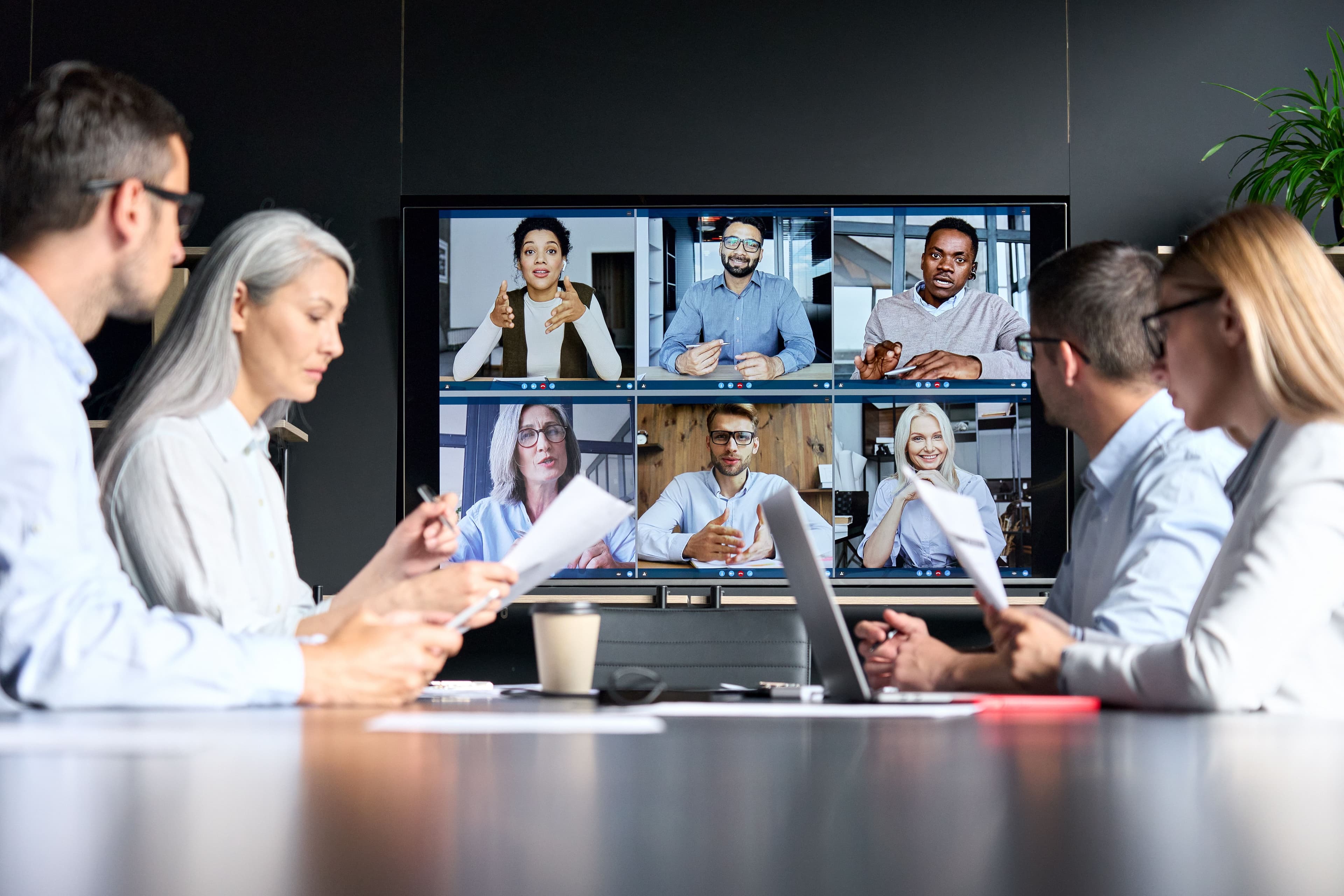 global-corporate-video-call-in-meeting-room-with-d-2025-02-11-16-23-09-utc.jpg