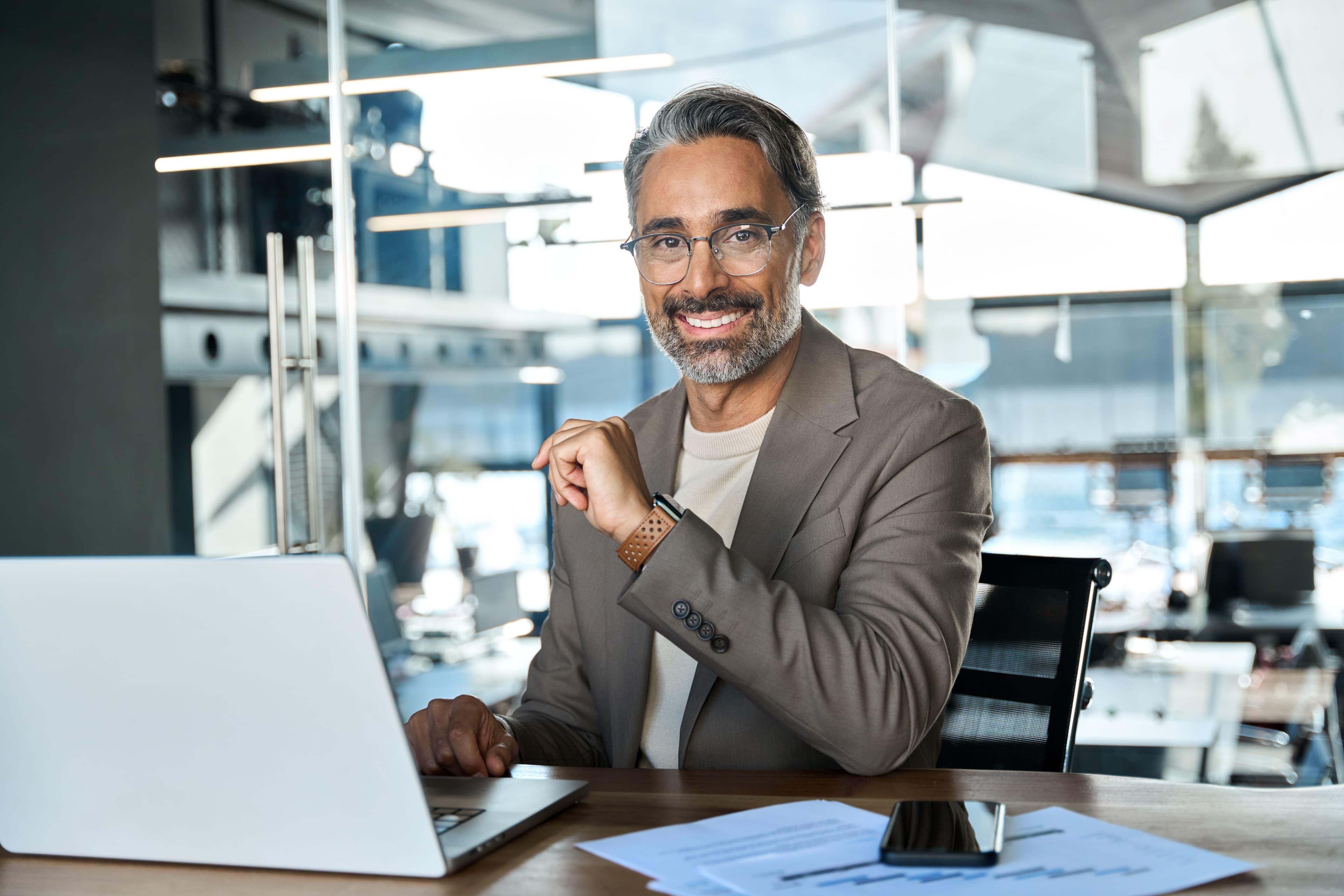happy-middle-aged-business-man-ceo-working-on-lapt-2025-02-11-15-56-59-utc.jpg