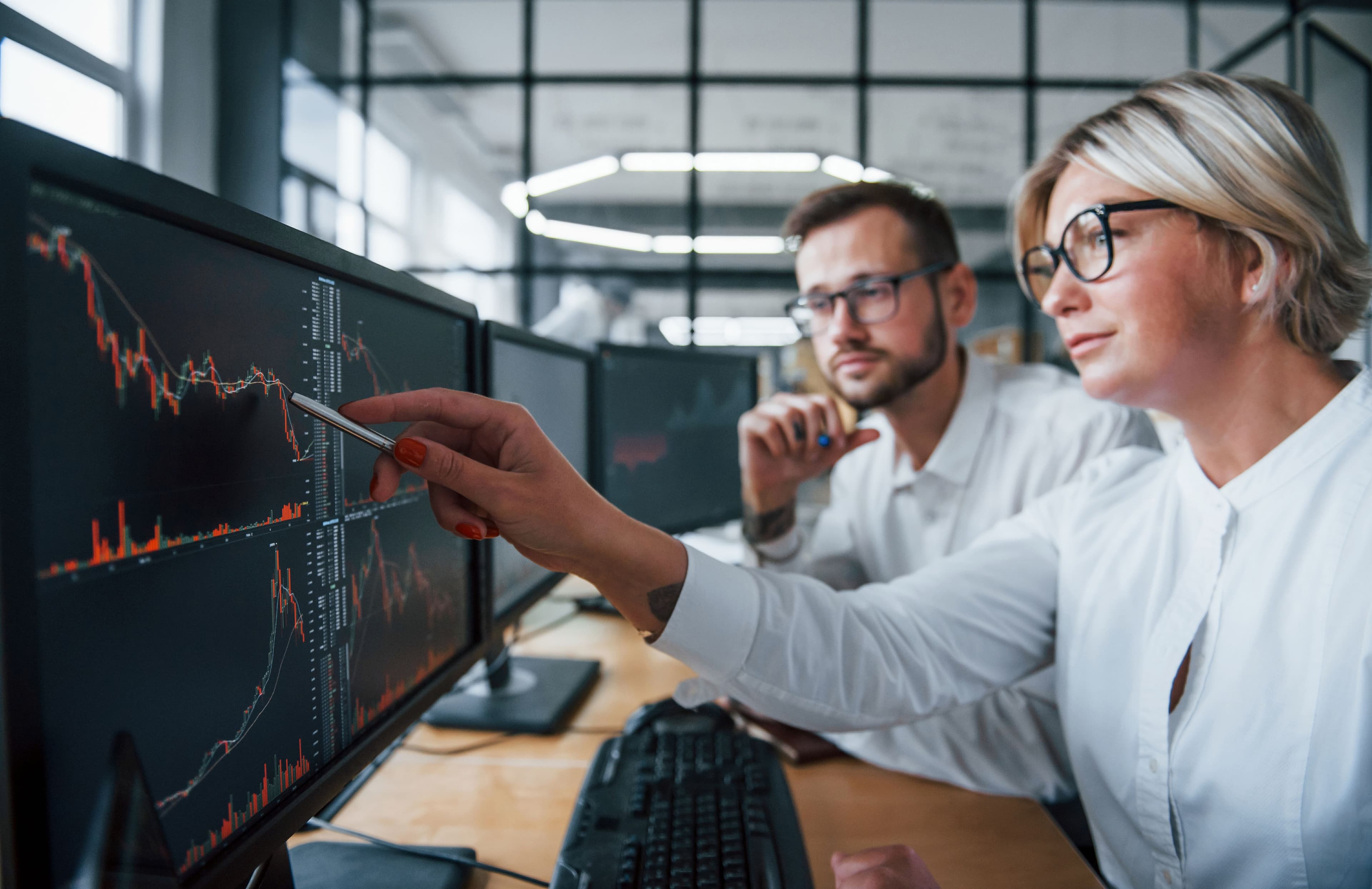 two-stockbrokers-in-formal-clothes-works-in-the-of-2025-03-18-21-13-11-utc.jpg
